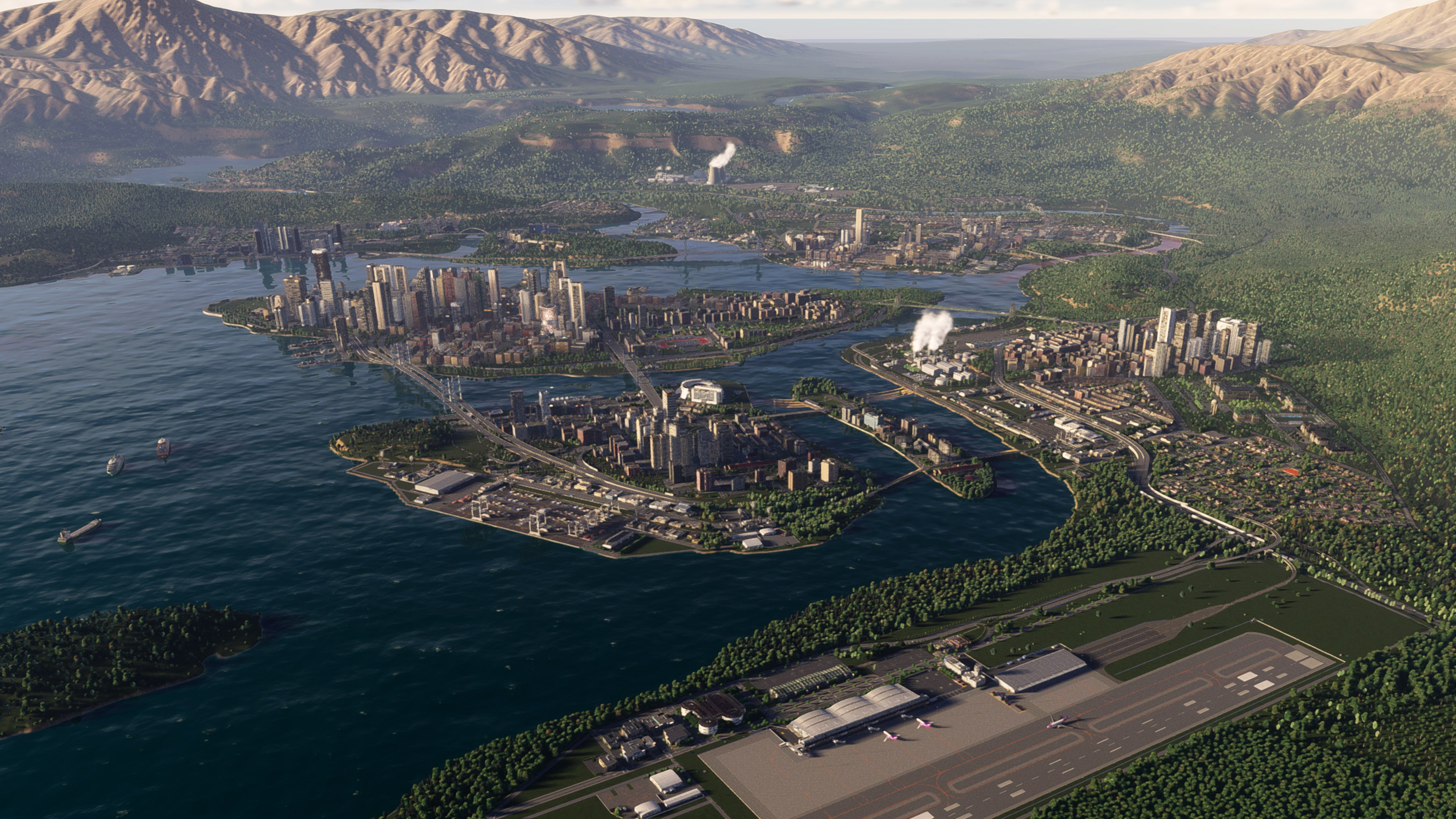 An aerial screenshot from Cities: Skylines II displays a sprawling modern city built around a body of water, surrounded by forested mountains.