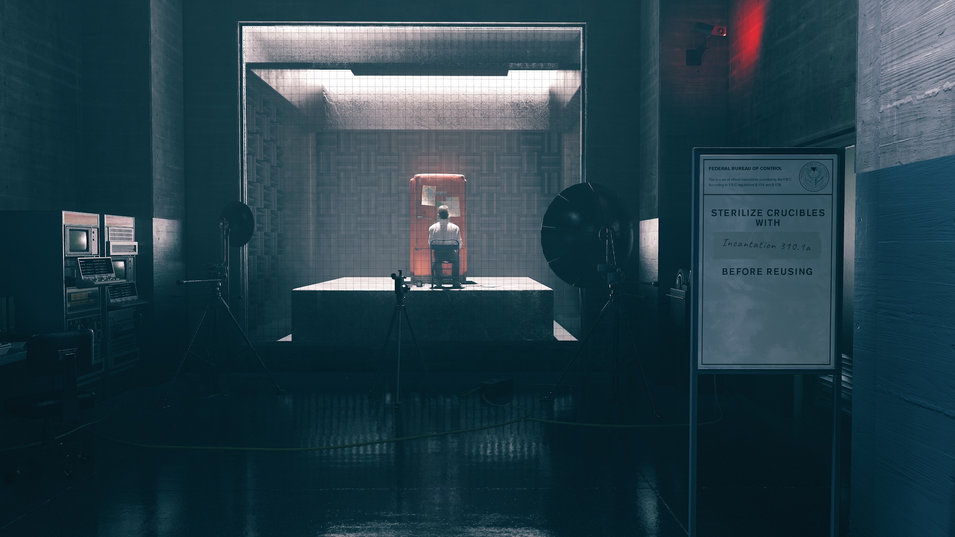 A person sits staring at a red refrigerator inside a glass containment cell in Control. Image courtesy of Remedy Entertainment (via IGDB).