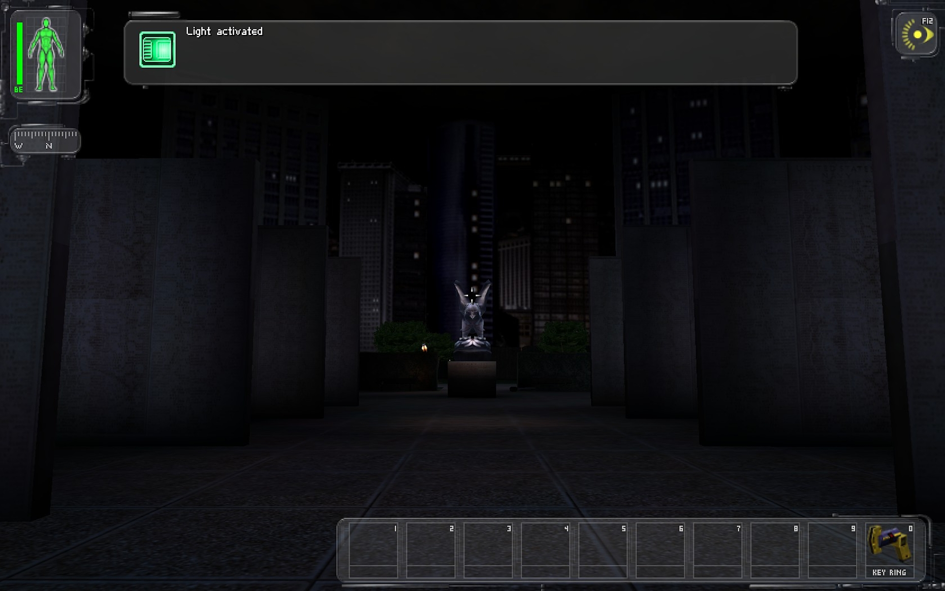 Statue of an eagle surrounded by 6 large structures with New York city night skyline in the background. Screenshot by author.