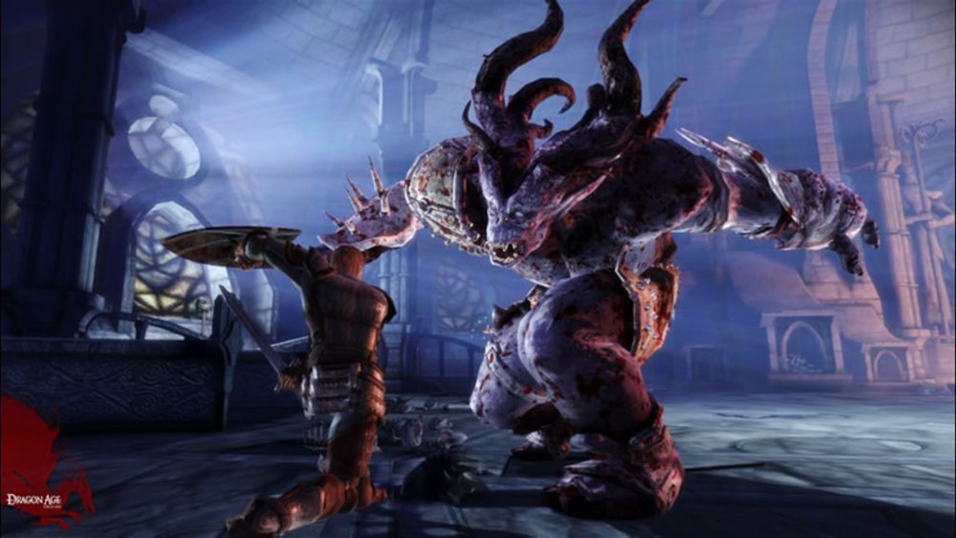 A screenshot from Dragon Age depicts a large, horned, demonic creature standing over a smaller, armored figure in a dark, stone environment.