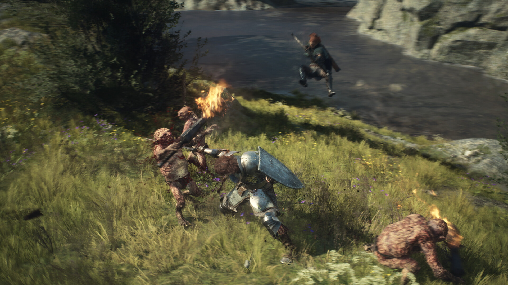 An armor clad protagonist of Dragon's Dogma 2 fighting goblins.