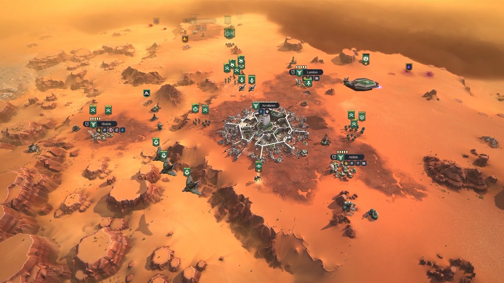 An aerial screenshot from Dune: Spice Wars shows a desert landscape with various futuristic structures and icons indicating units and locations.
