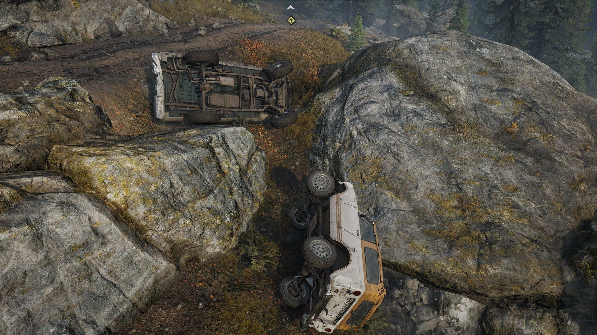 Two cars in Snowrunner, turned upside down in a ditch. Screenshot by author.