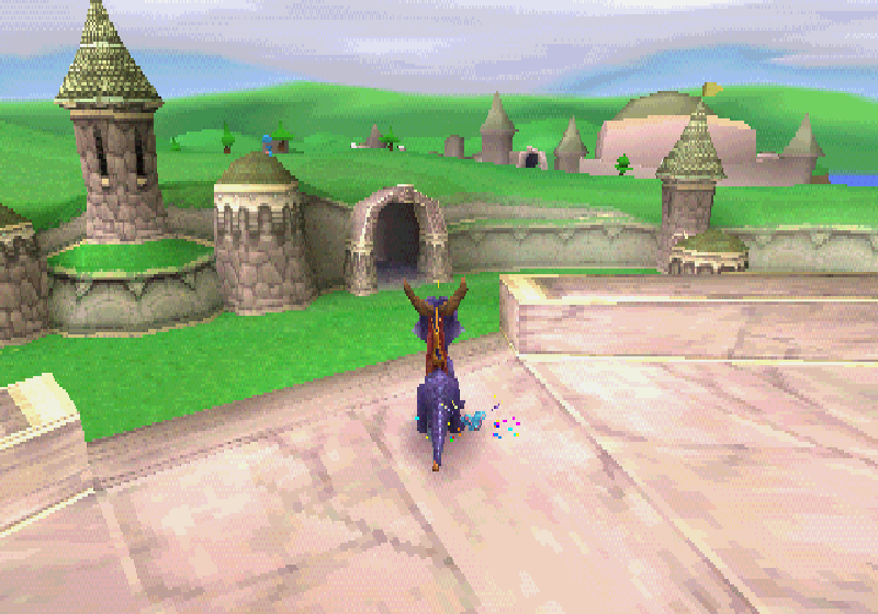 Spyro of Spyro the Dragon (1998) standing in front of rolling hills and castles.