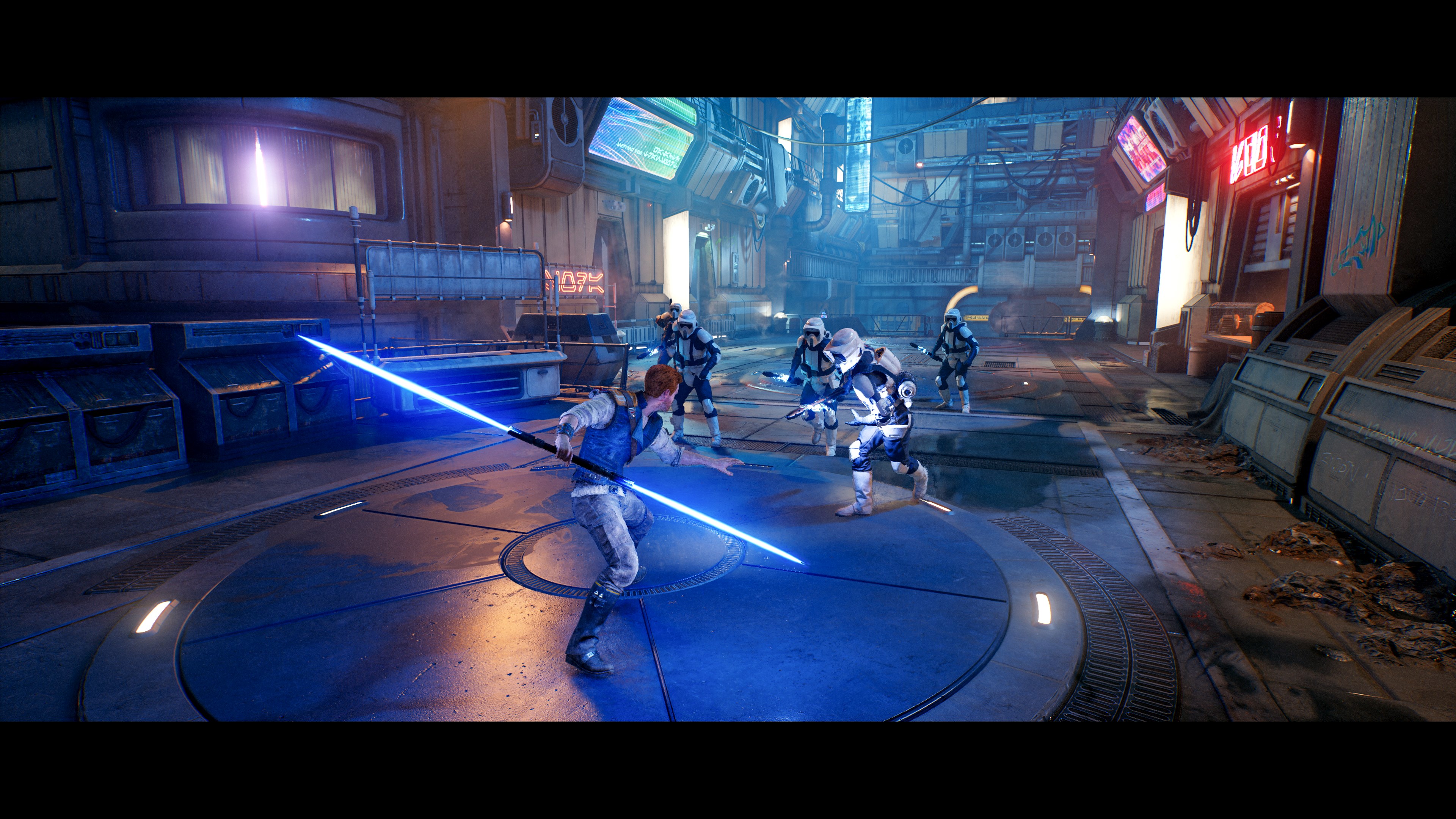 A screenshot from Star Wars Jedi: Survivor shows a Jedi character with a blue lightsaber facing several stormtroopers in a futuristic, industrial setting.