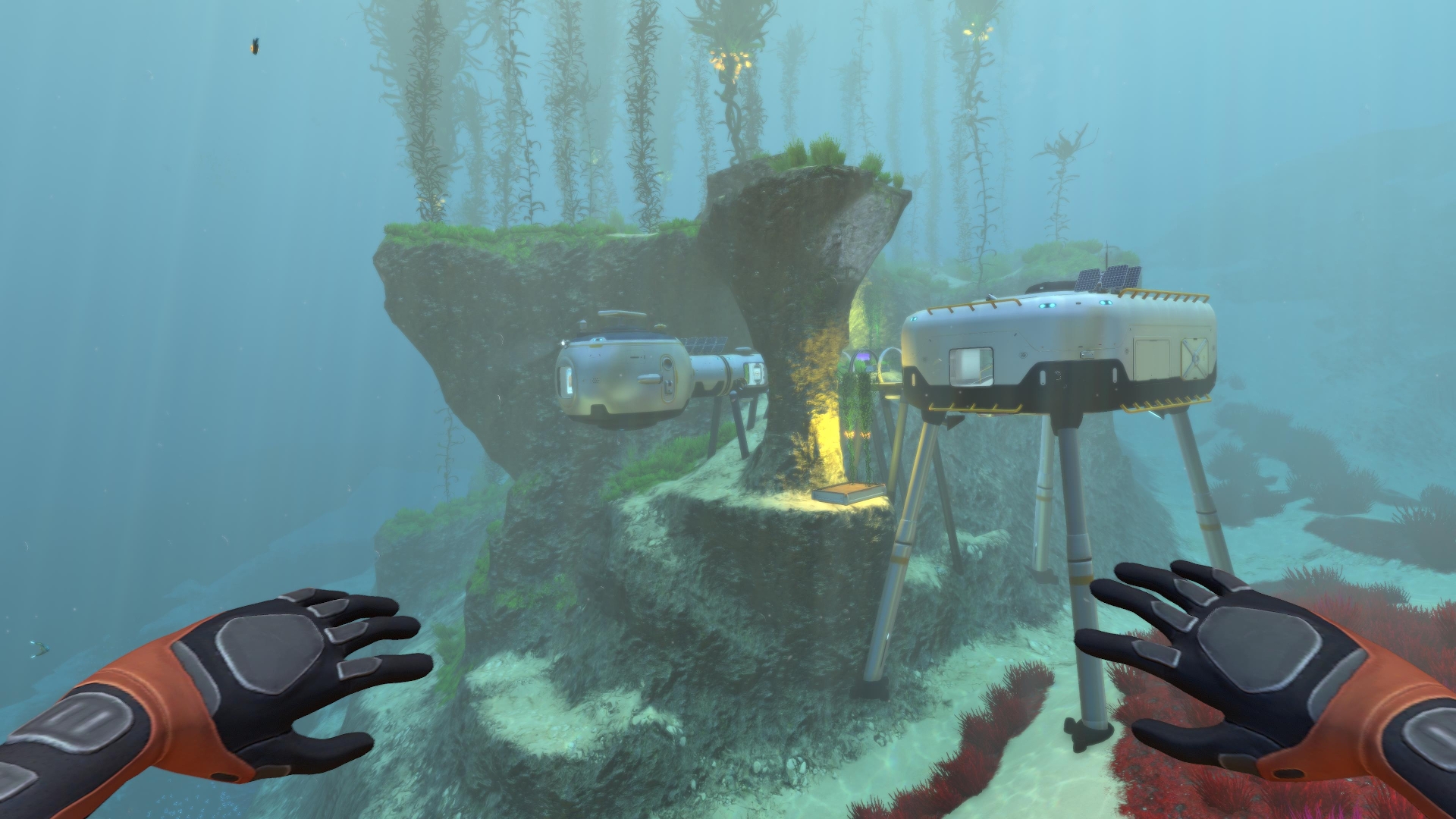 Subnautica features a modular underwater base with an observatory and solar panels near a tall kelp forest. Screenshot by author.