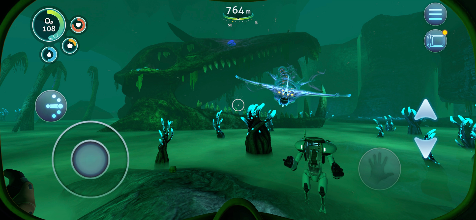 Subnautica: a massive decaying skull in a green-tinted underwater cave, with a ghost leviathan swimming towards the player. Image courtesy of Playdigious.
