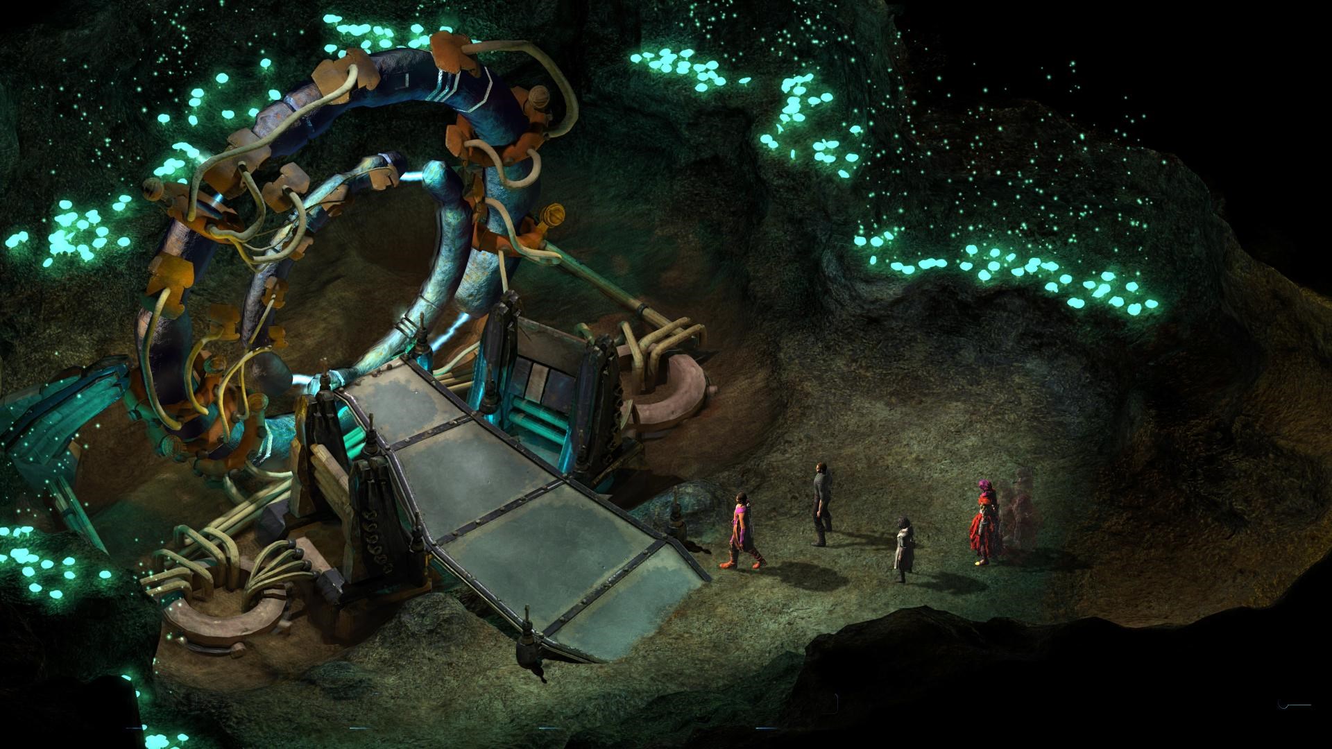 A screenshot from Torment: Tides of Numenera, shows several characters in a dark, cavernous area with glowing green lights, one character appearing to be using a large mechanical device.