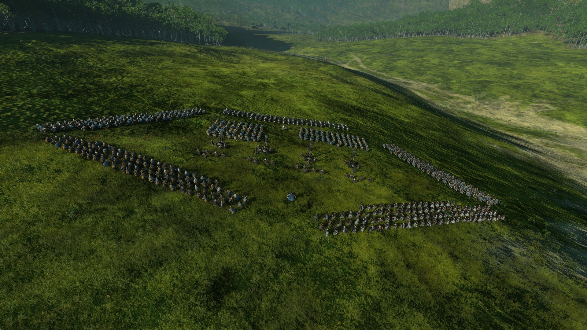 Total War: Warhammer III depicts military dwarf formation with ranged units and artillery surrounded by dwarf shield walls.