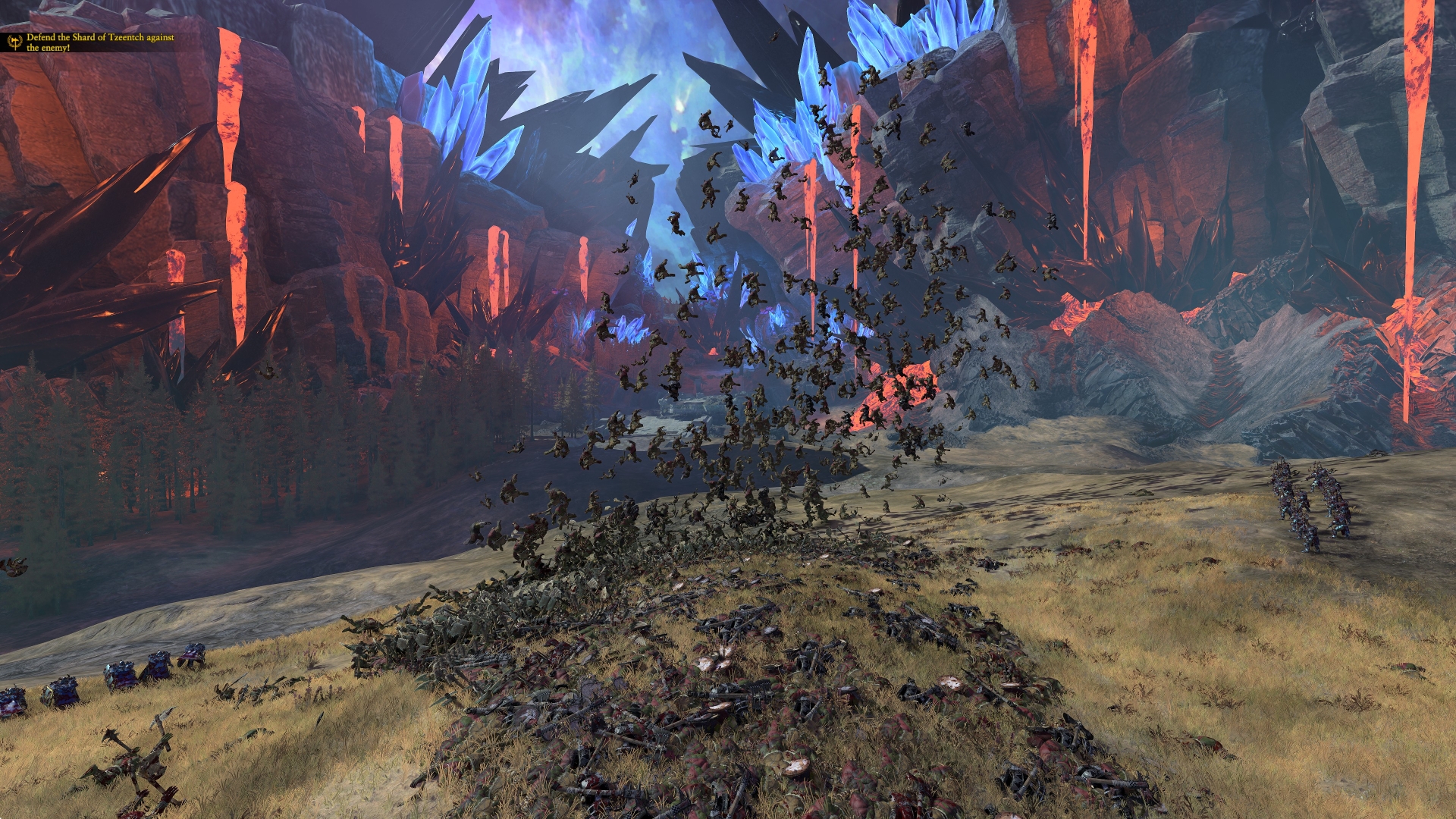 Total War: Warhammer III shows a broken formation of orcs with a few dozen orcs thrown up in the air.