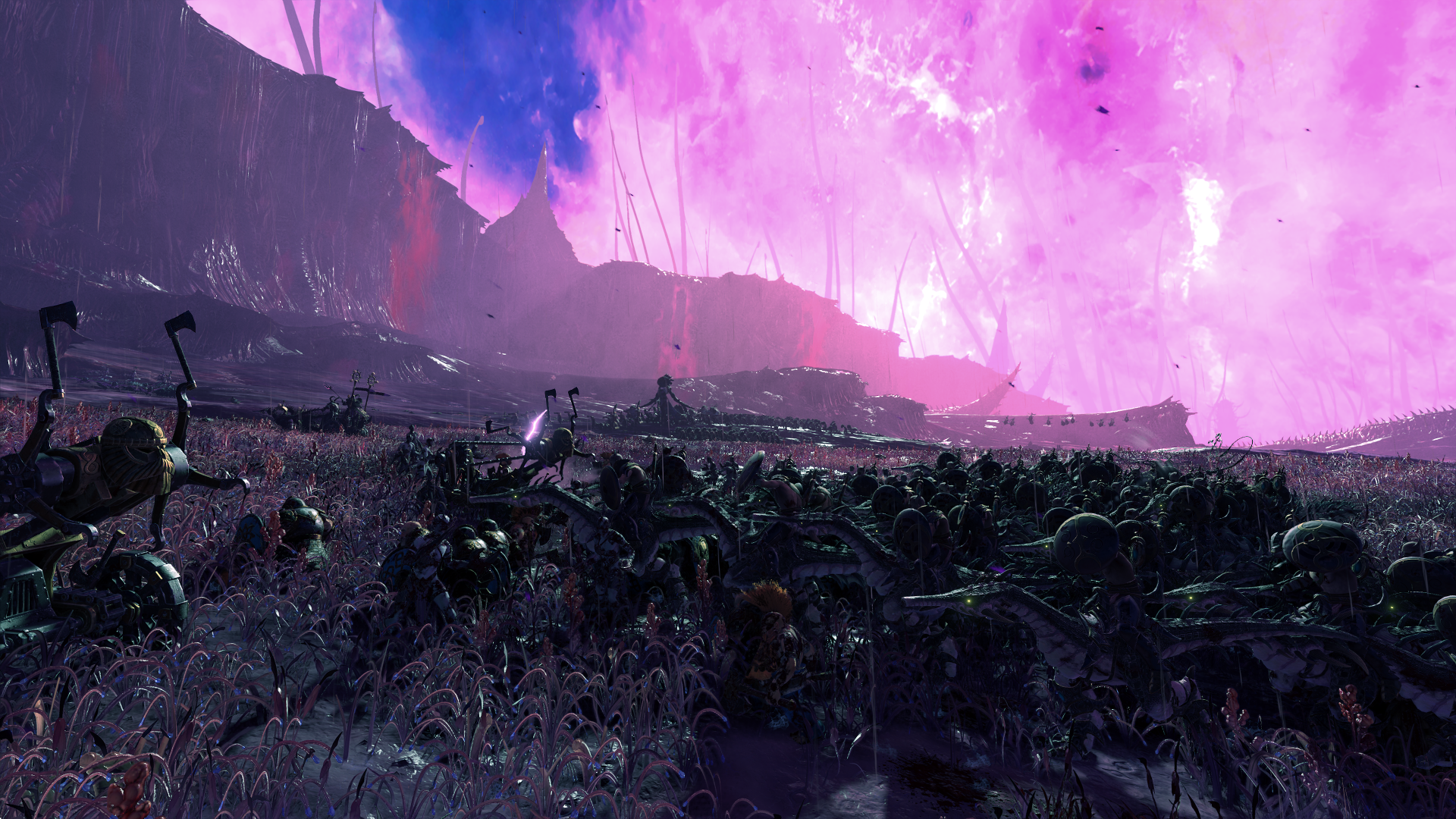Total War: Warhammer III shows an army of dwarfs clashing with followers of Slaanesh with a vibrant pink and purple sky in the background.