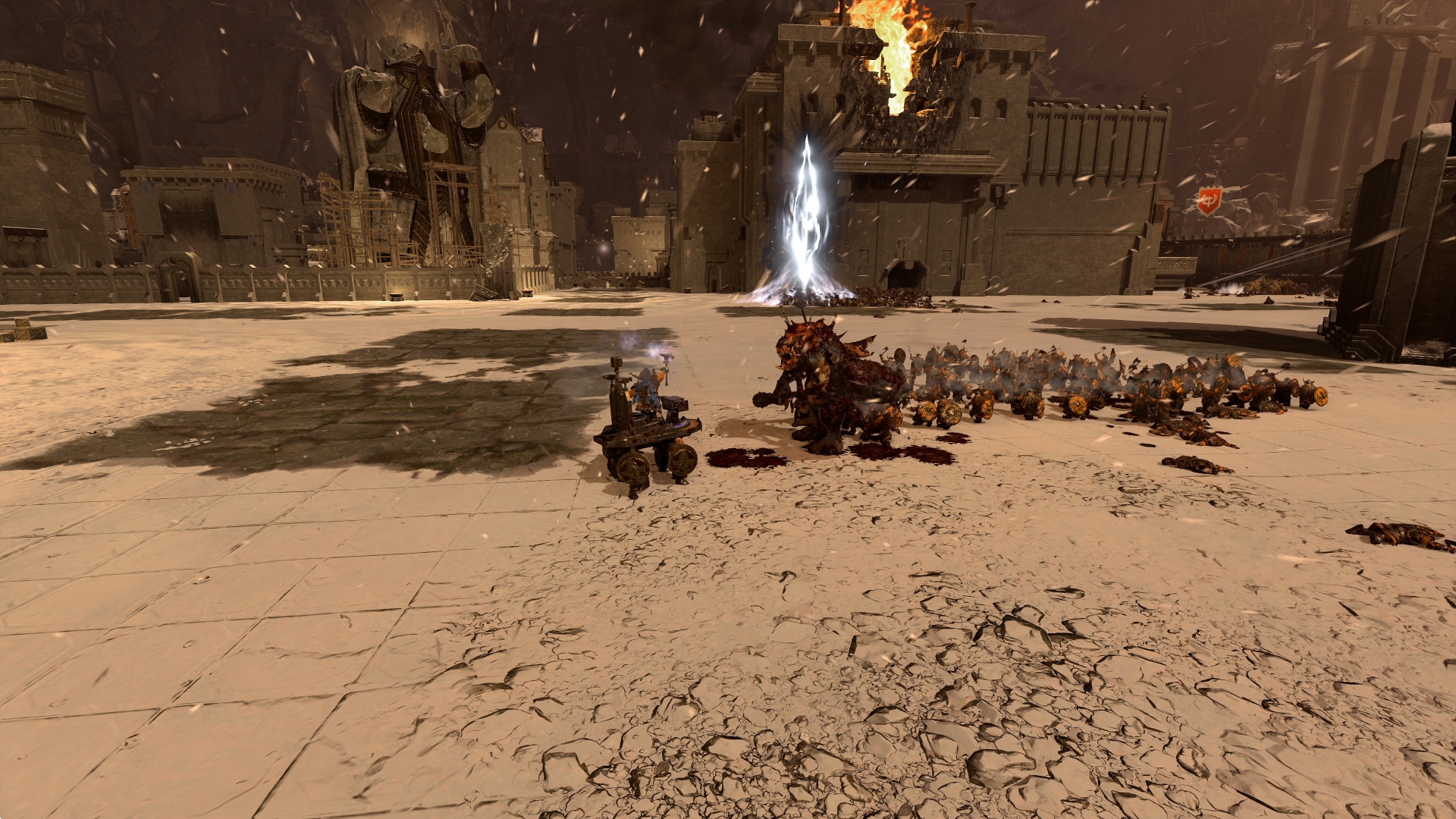 Dwarfs facing off against a massive troll during a dwarf city siege in Total War: Warhammer III. Screenshot by the author.
