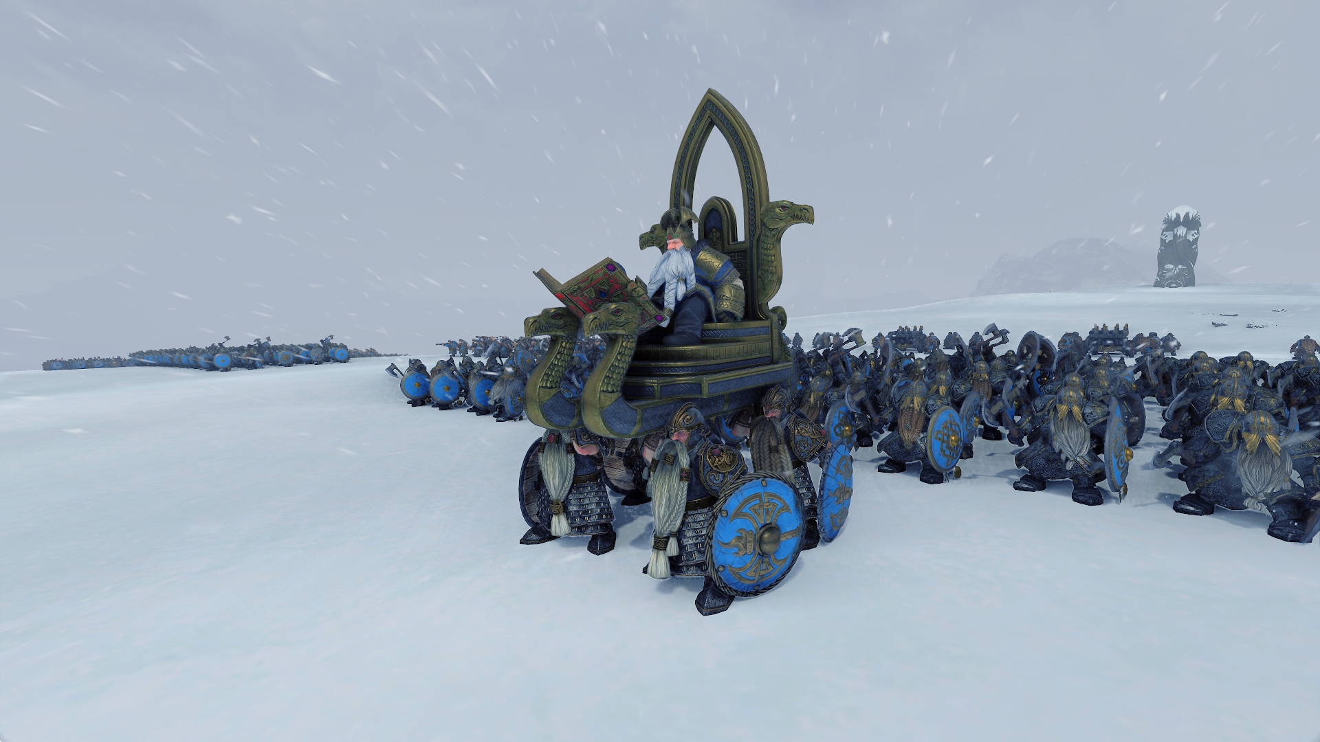 Thorgrim Grudgebearer carried on a throne in front of his troops in Total War: Warhammer III. Screenshot by author.