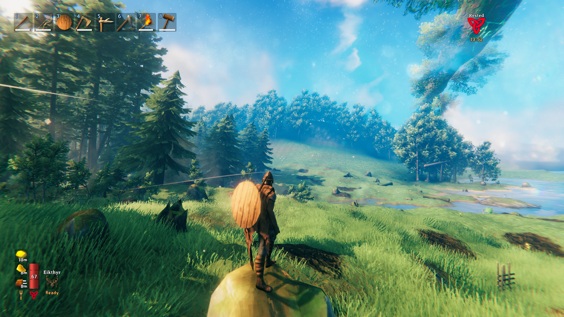 A protagonist of Valheim - well fed and rested - standing among the meadows. Screenshot by author.